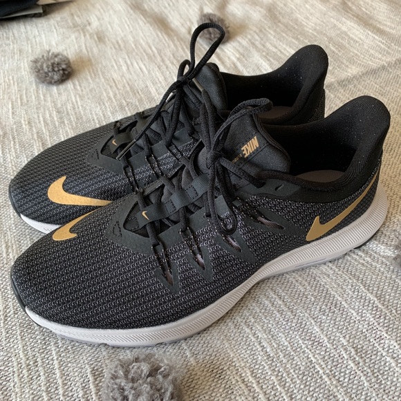 Nike Shoes - NWOB Nike Black and Gold Running Shoes
